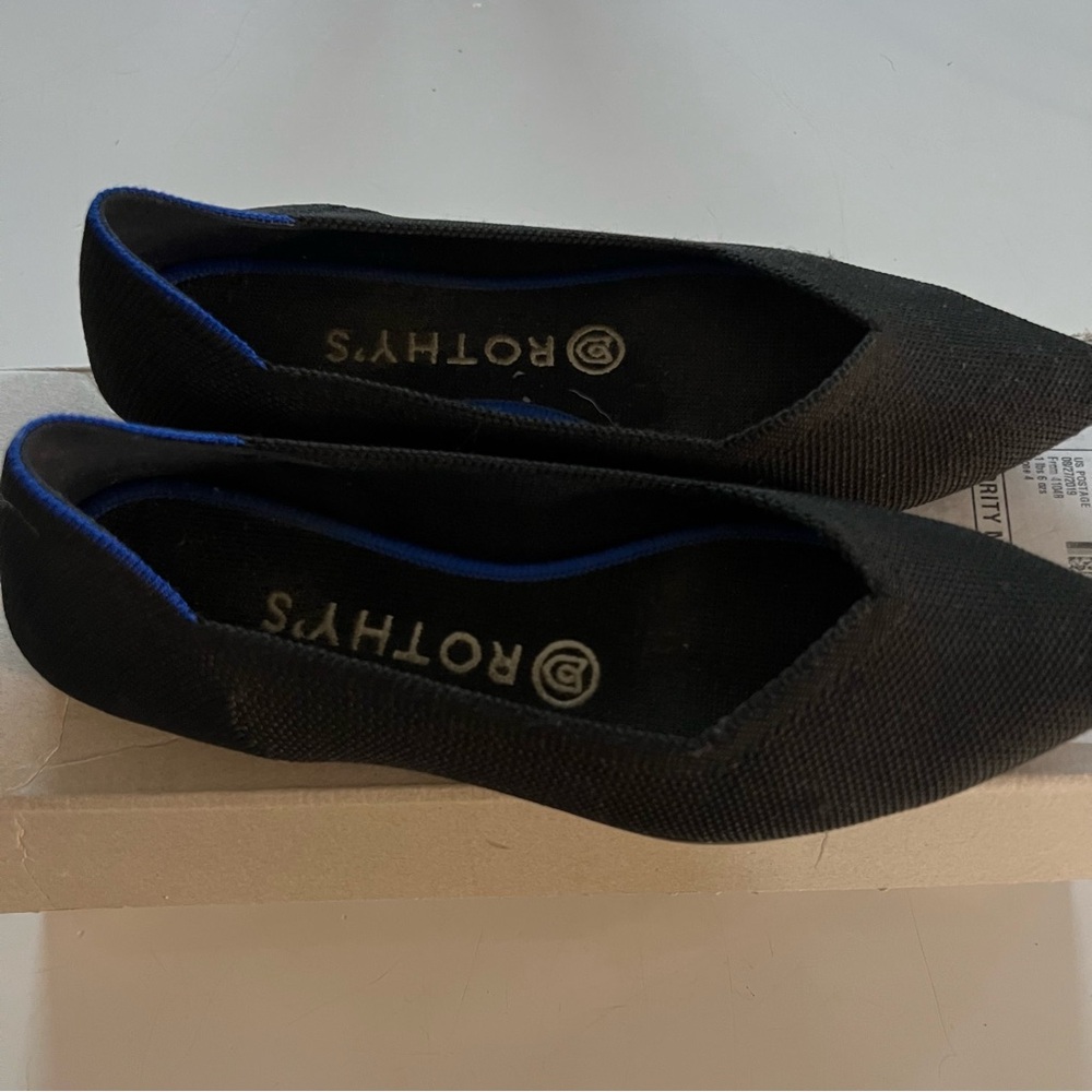 Rothy's Black Pointed Toe Flats with Blue Trim